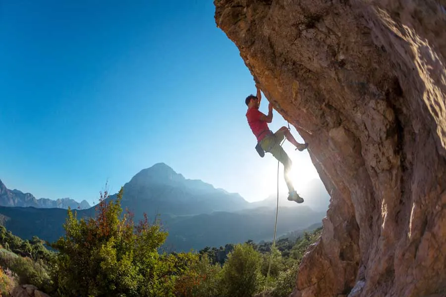 Climber on an overhanging rock face