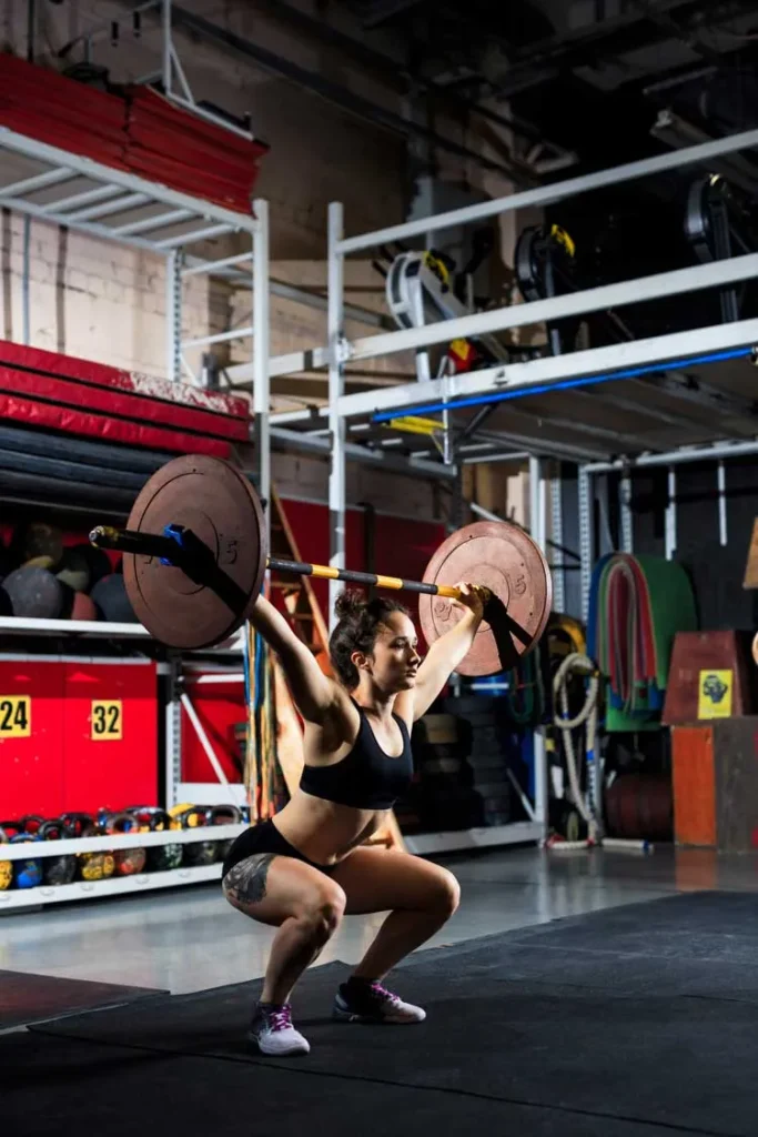 Athlete working out with weights