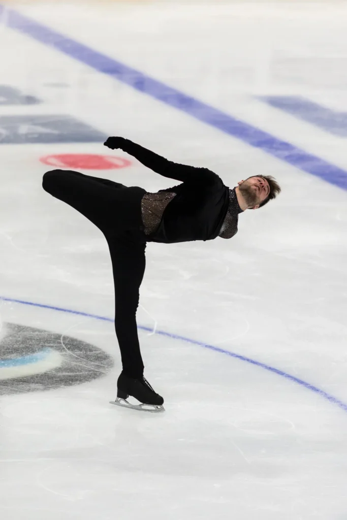 Figure skater executing graceful spin on ice