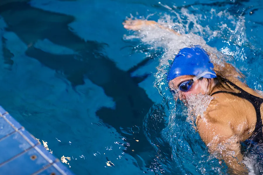 Swimmer training in a pool