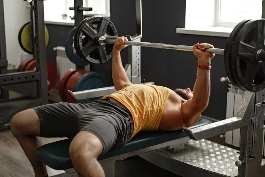 bearded man bodybuilder doing bench press exercise 2025 02 24 22 37 31 utc