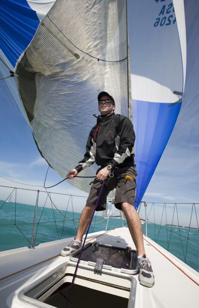 Sailor managing pressure and changing conditions on the water