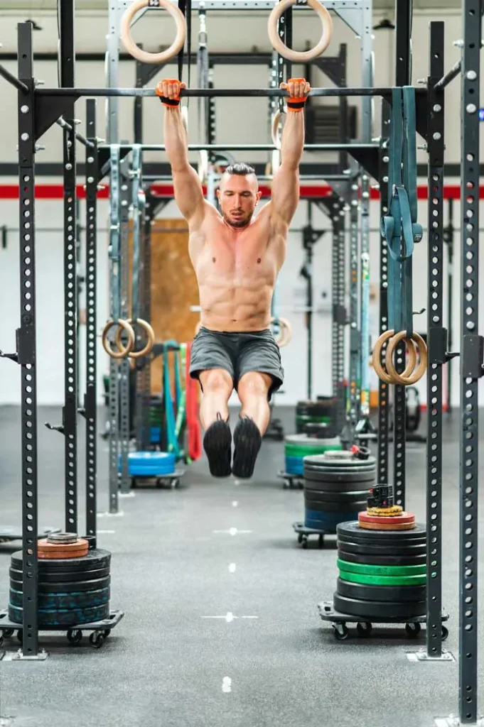 Athlete performing a muscle-up exercise
