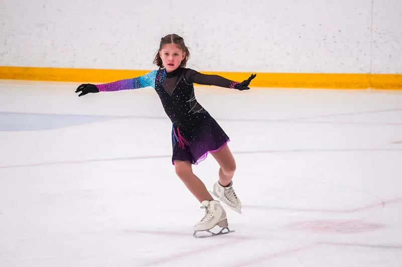 Figure skater performing on the ice